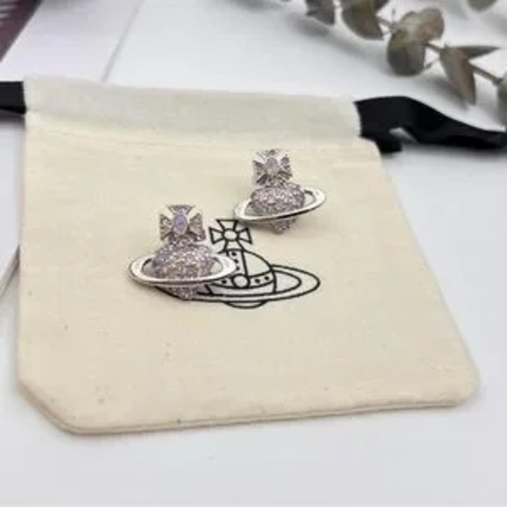 Vivienne Westwood purple Saturn heart earrings